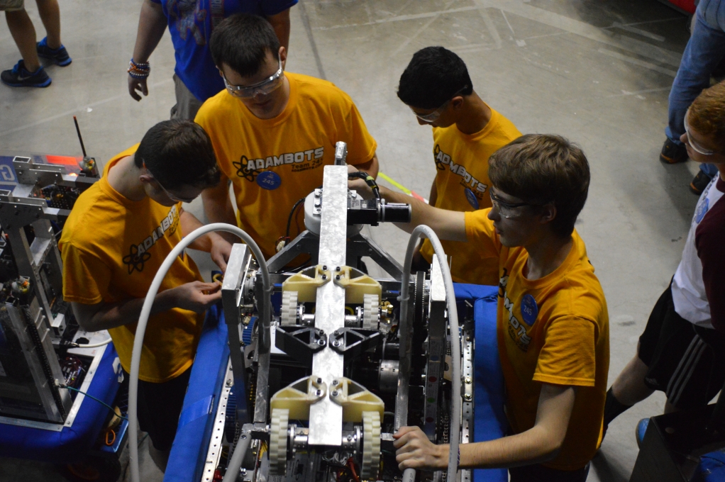 At the Michigan State Championships, the drive team inspects Andromeda